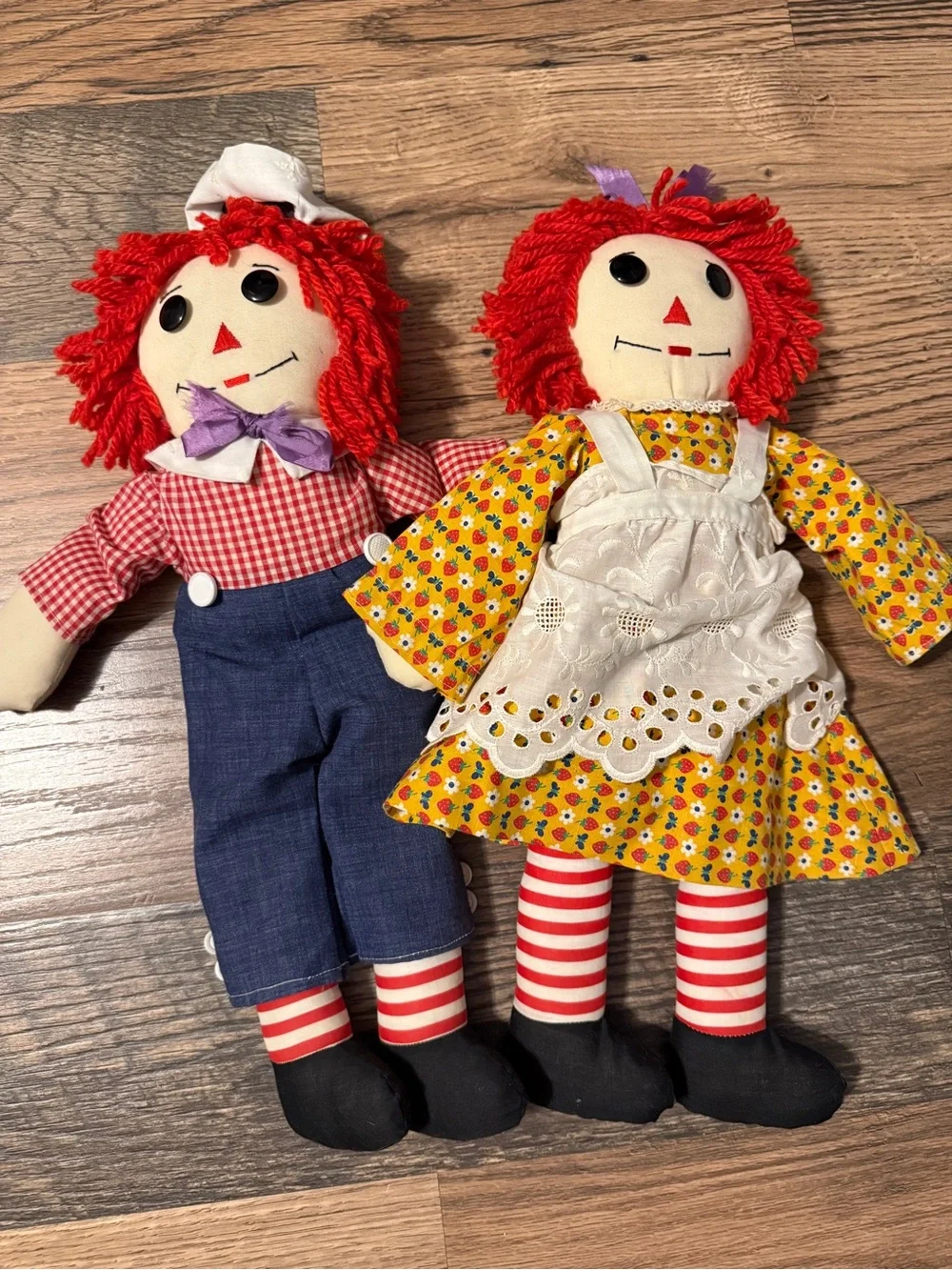 Vintage Raggedy Ann and Andy cloth dolls with removable clothing